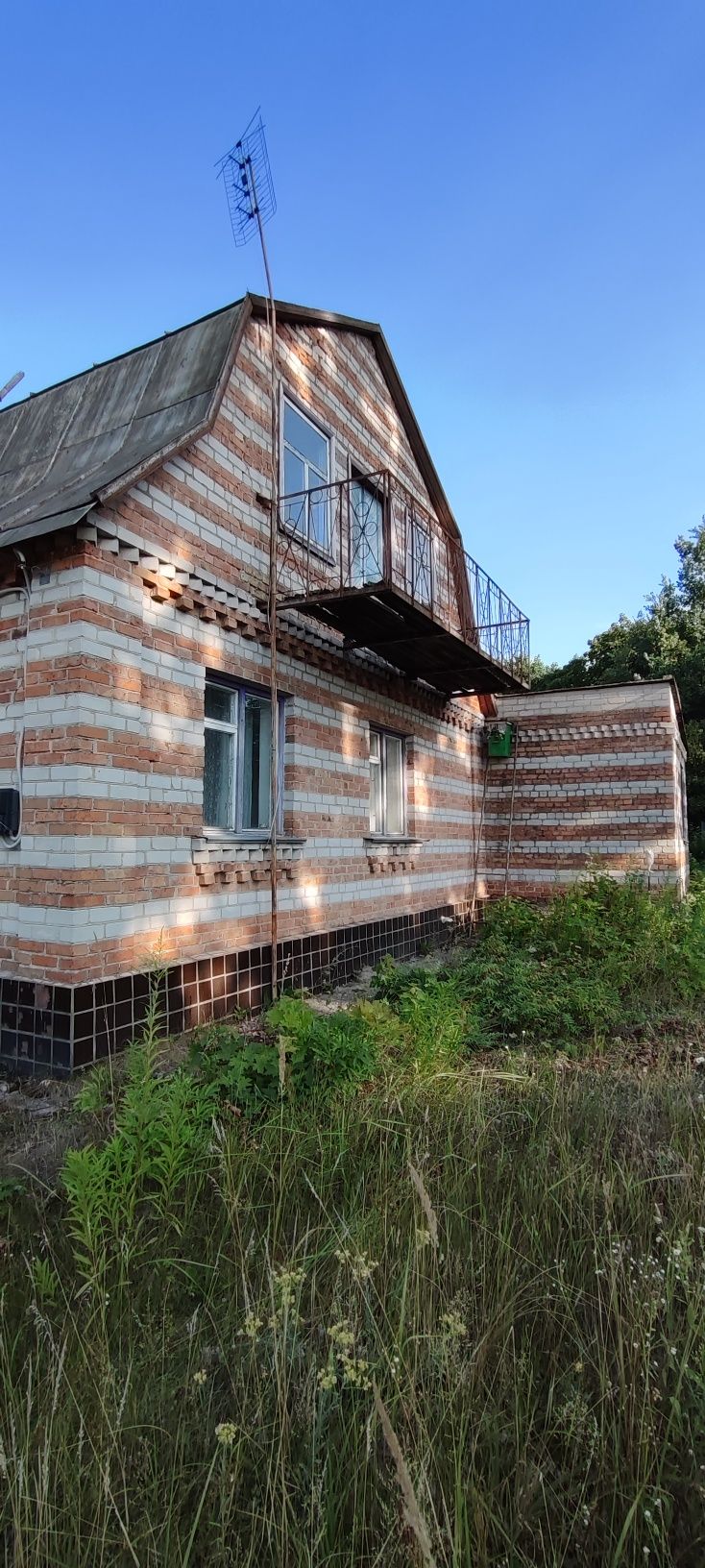 Продам фасадну ділянку з будинком в Корчаку