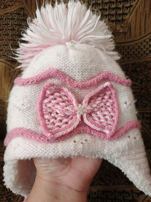 Зимові шапки на дівчинку