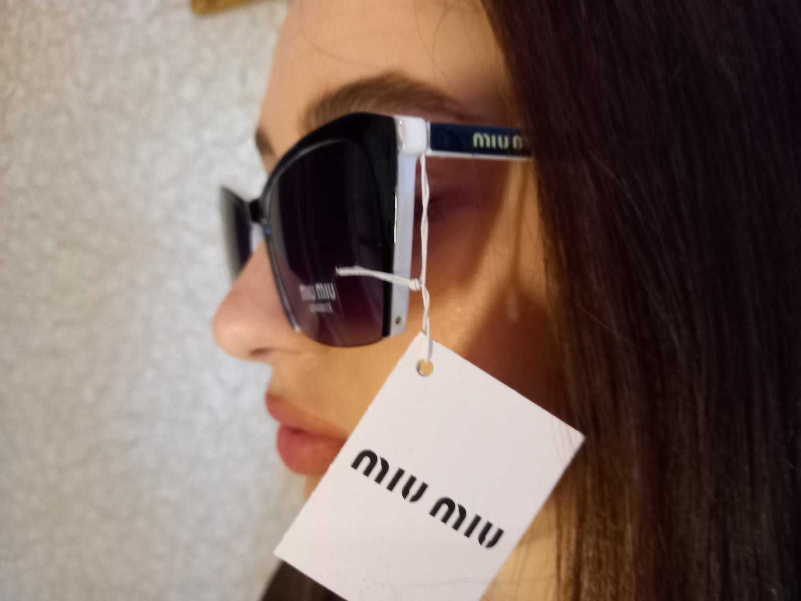 Солнцезащитные очки Miu Miu