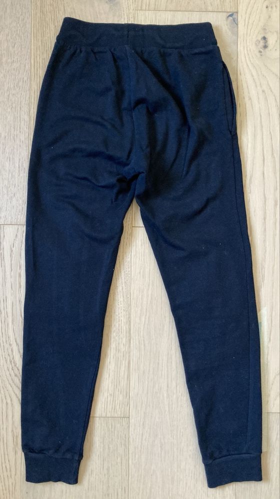 Spodnie dresowe tregginsy czarne Pepco r. 140
