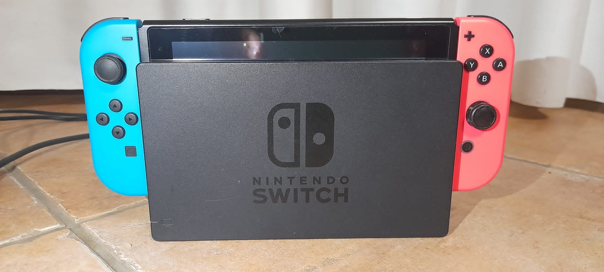 Nitendo Switch V1 + suporte comandos capa original 1 comando 3 jogos