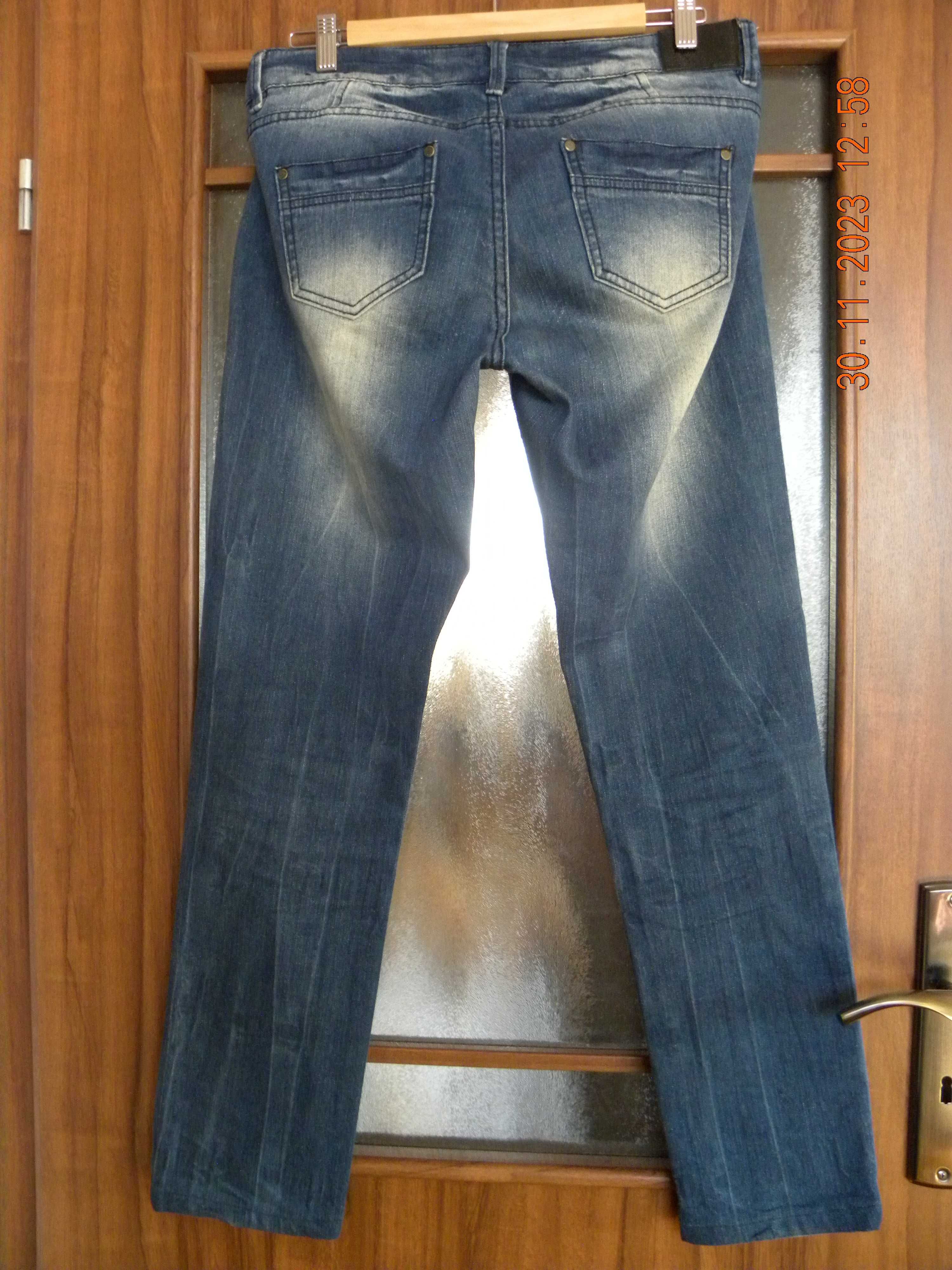Spodnie dżinsowe przecierane; rozmiar  XL
