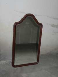 Espelho com moldura em madeira maciça de mogno