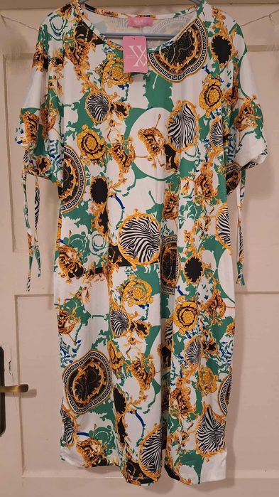 Sukienka Wawa. Świetna. 134 biust.