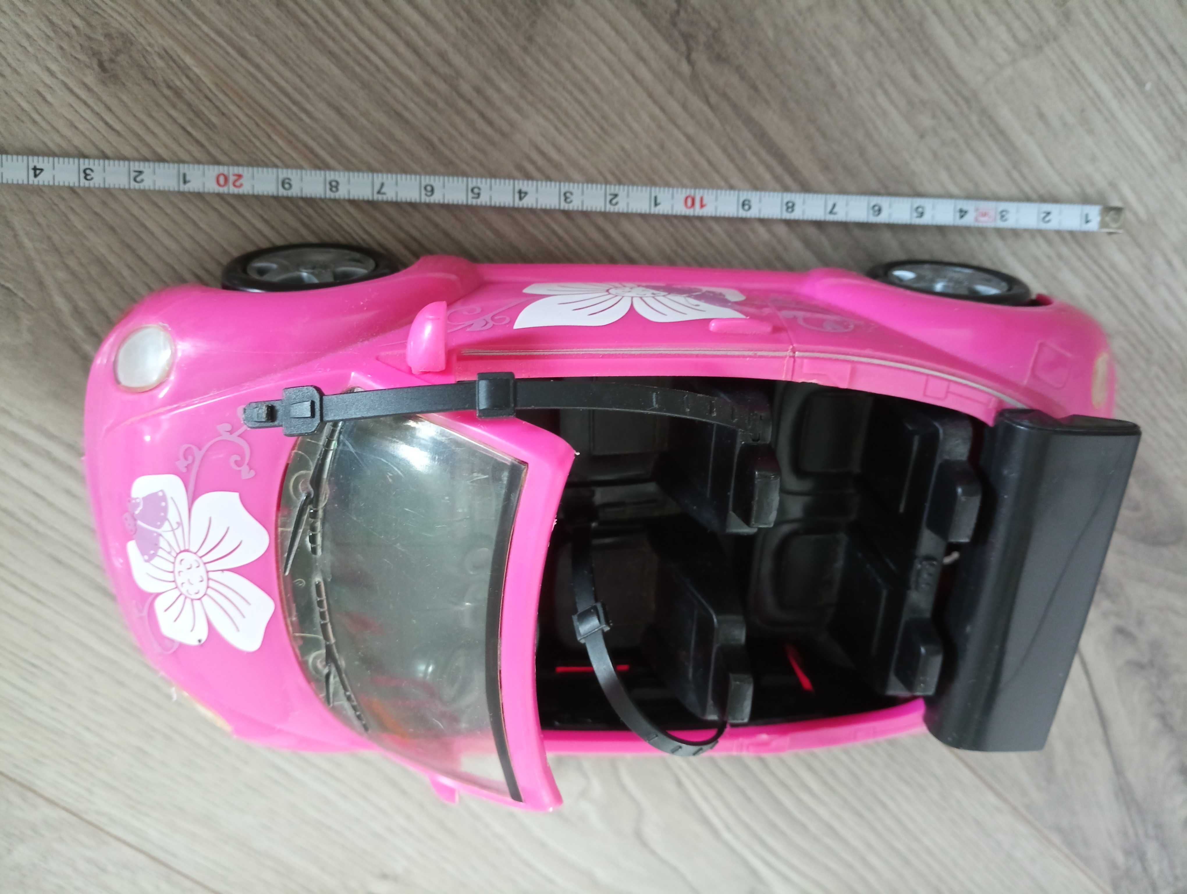 Plastikowy różowy samochód dla lalek