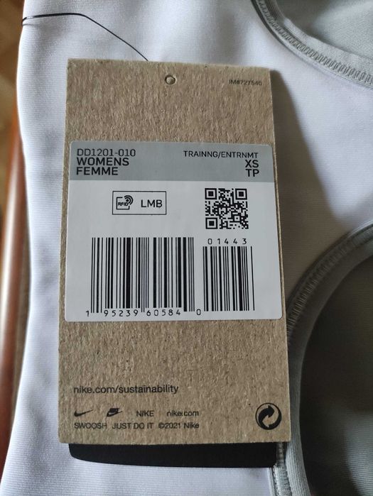 Damski stanik sportowy Nike w kontrastowych kolorach, rozm. XS
