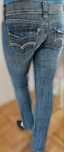 Levi's jeansy bootcut biodrówki przetarcia z USA