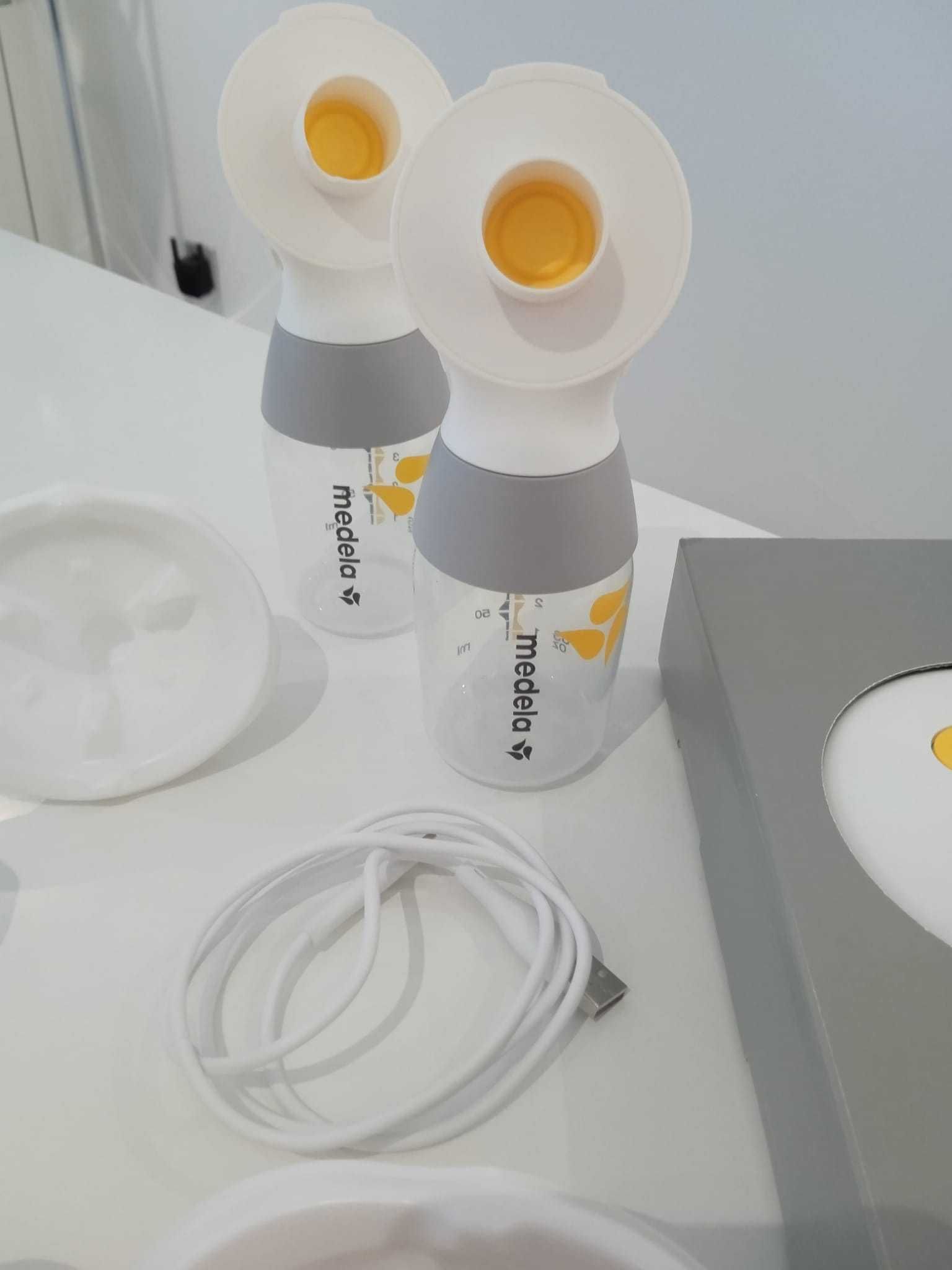 Bomba de leite dupla Medela Swing Mac