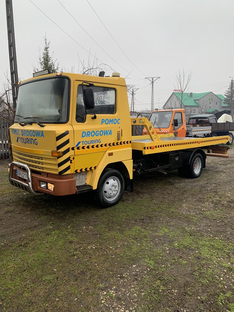 Autolaweta Nissan L50 hydrauliczny najazd