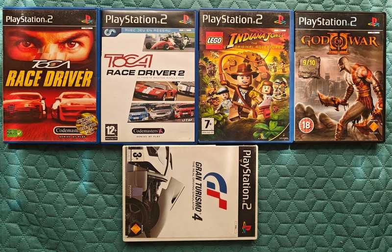 PlayStation 2 Slim + comando + 1 memory card + jogos