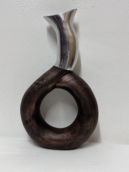 Peça decorativa em metal