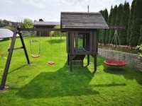 Domek ogrodowy dla dzieci z huśtawką