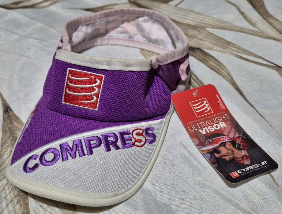 Pala corrida Compressport nova