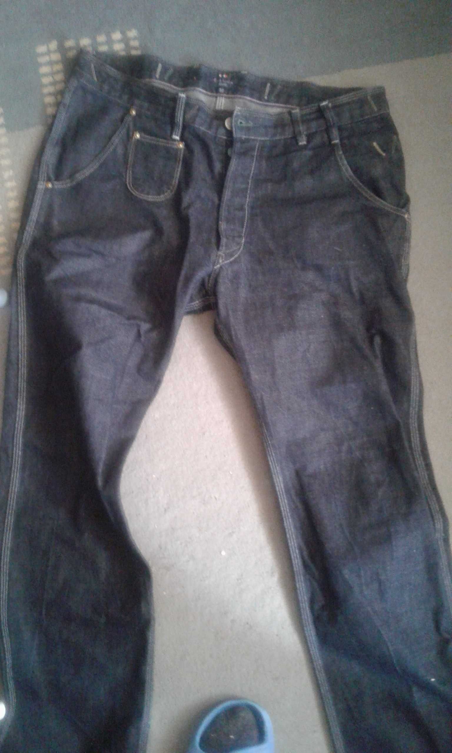 Spodnie męskie jeansy skórzane jak nowe bardzo ładne