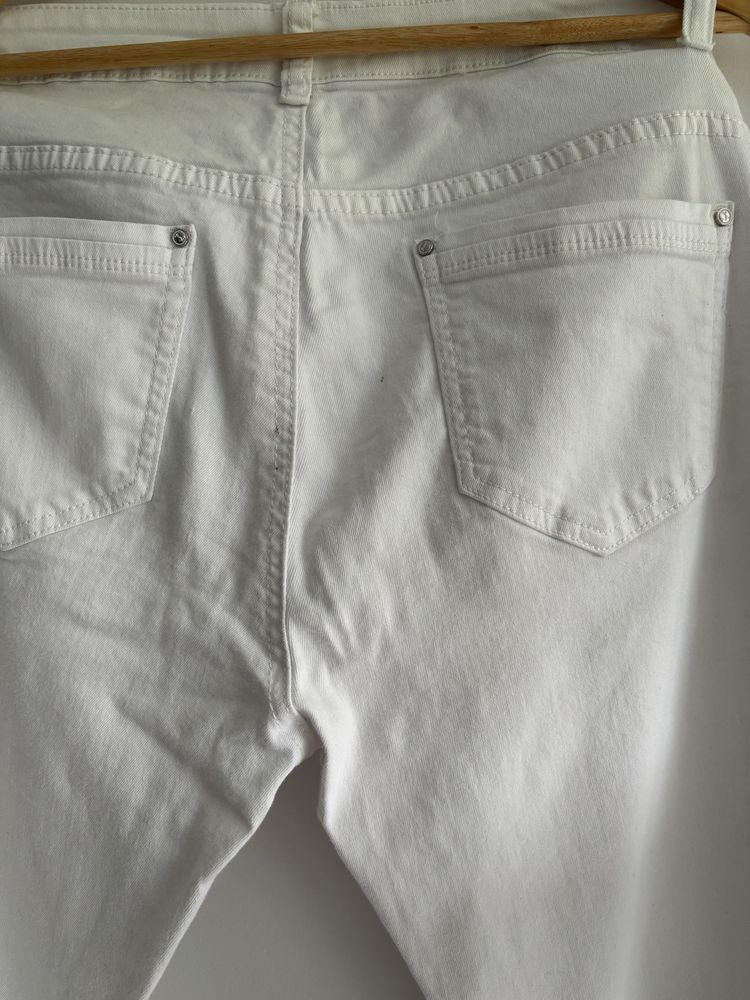 Białe spodnie dżinsowe skinny rurki strech 38 40 M L