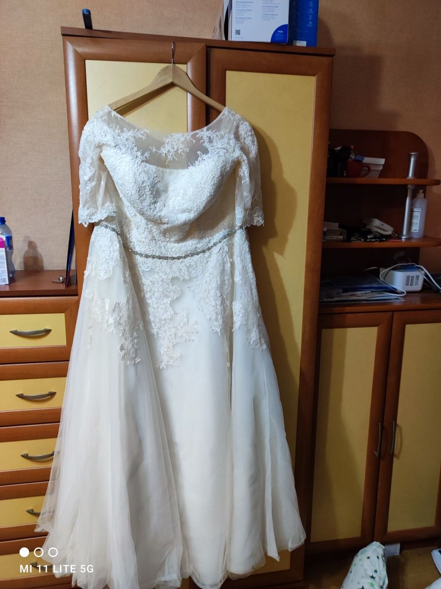Suknia ślubna. Kolor ecru plus size