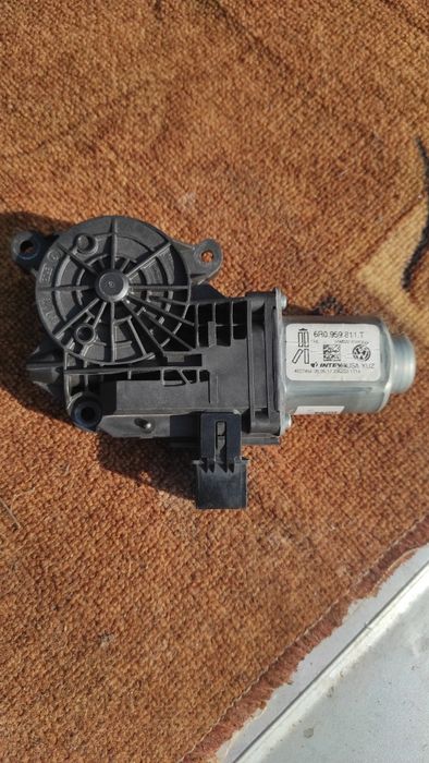 Моторчик стеклоподъёмника Фольксваген 6R0.959.811.T