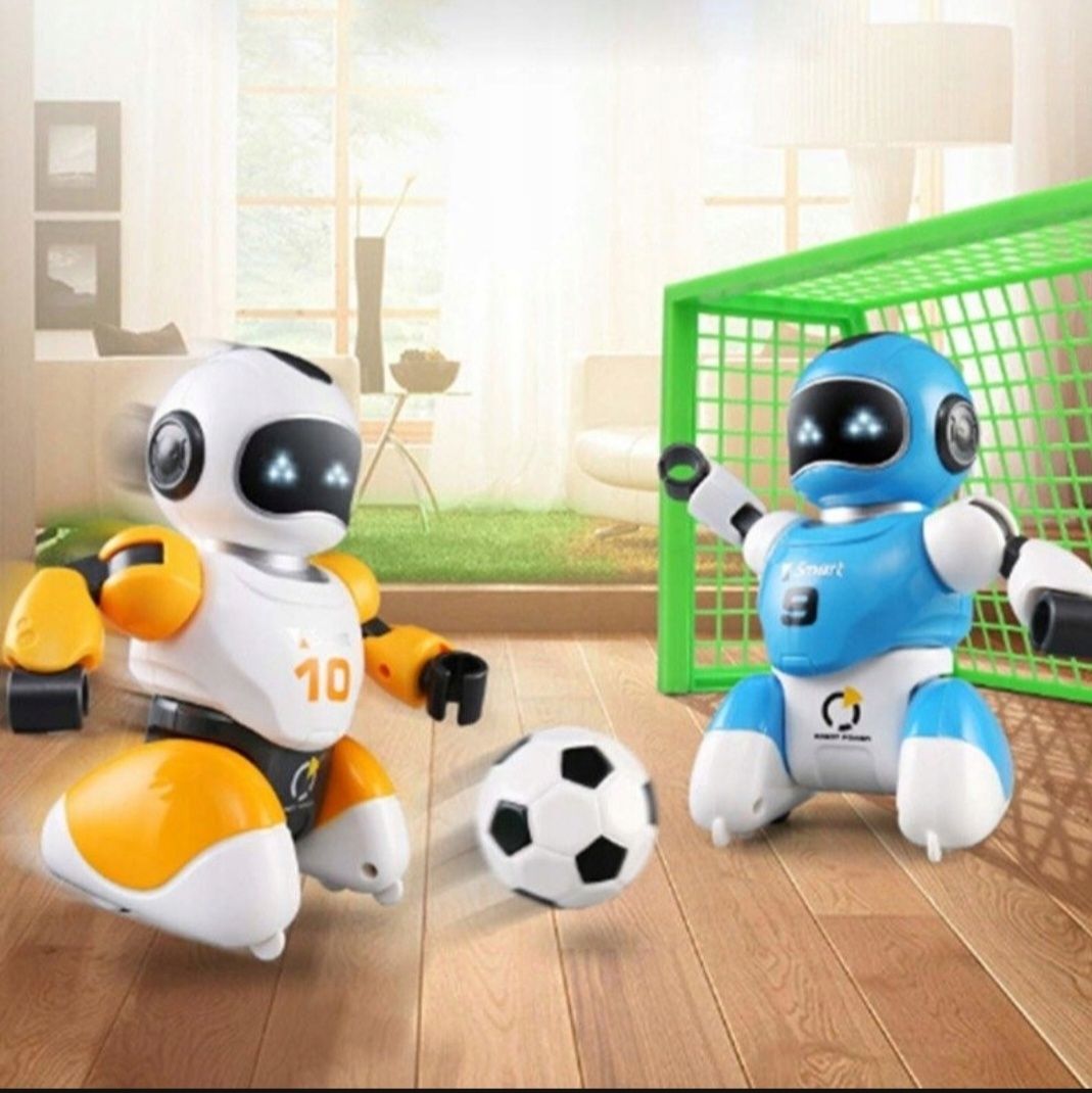 Dwa roboty interaktywne grające w piłkę