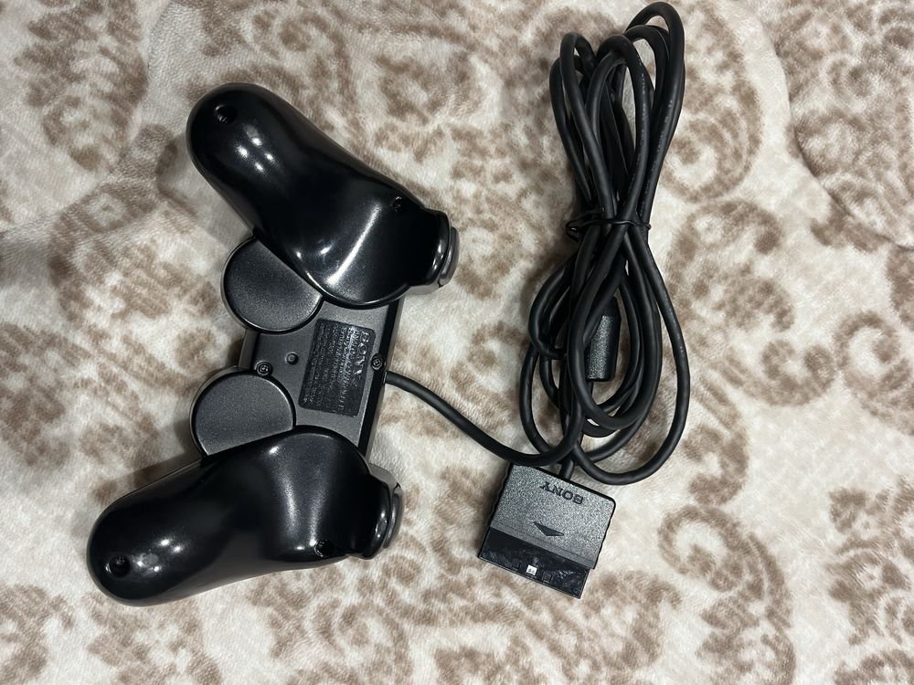 Comando PS2 com avaria