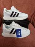Акція знижка кросівки жіночі шкіряні білі adidas retropy