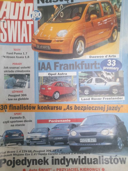 AŚ Peugeot 306 Corolla Brava Cherokee Xsara Mercedes SL IAA rok 1997