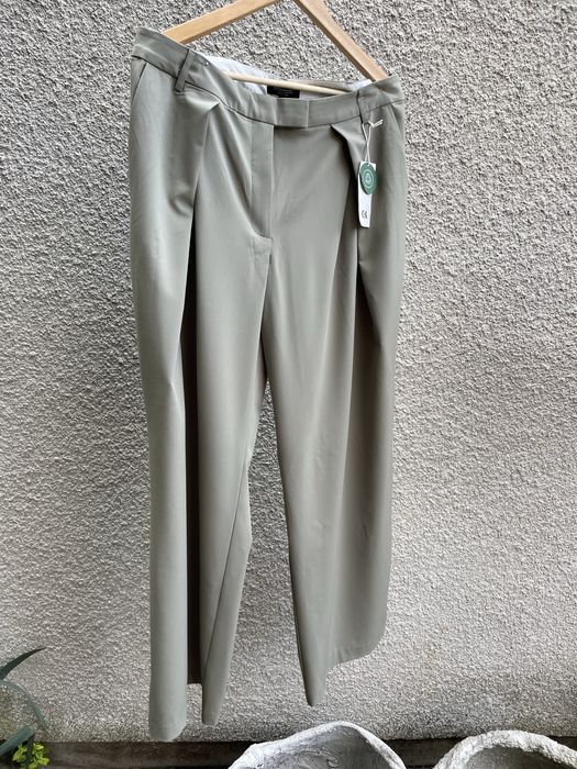Nowe z metką garniturowe szerokie spodnie khaki rozmiar 44