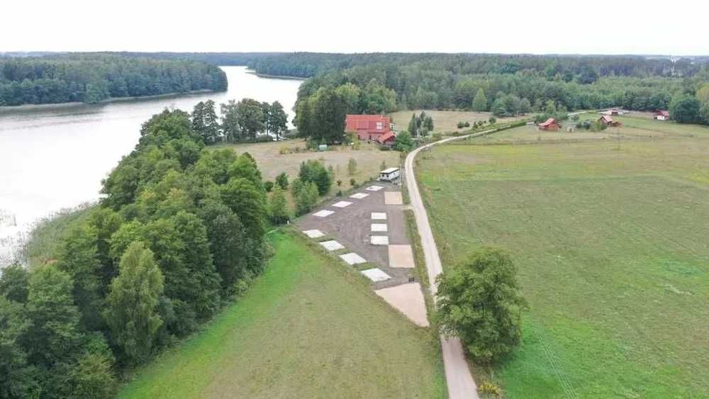 Działka nad jeziorem Domek Letniskowy pomost jacuzzi na Mazurach port