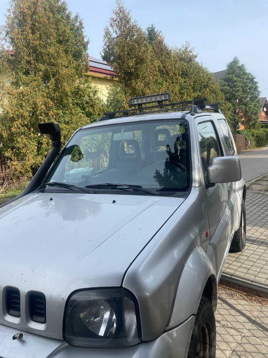 Suzuki Jimny Ranger z wyposaż. off-road (wyciągarka, halogen, snorkel)