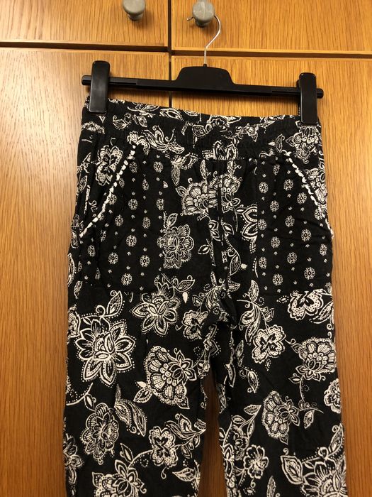 Calças de tecido pretas