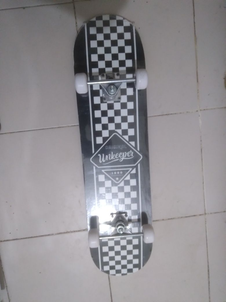 Skarte ukeeper plastificado
