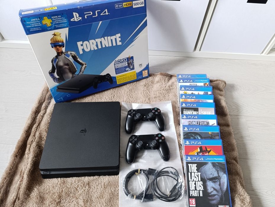 Bundle PS4 Slim + 2 comandos + 9 jogos + caixa e cabos originais