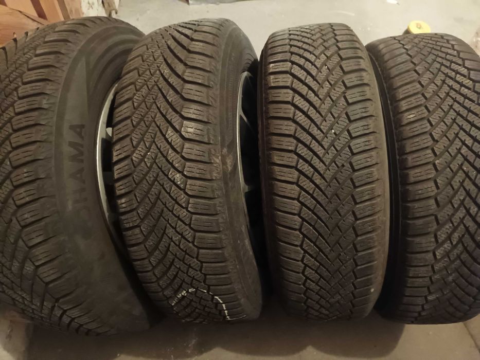 Koła kpl opony zimowe 195/65R15 Yokohama - felgi 5x114,3 z kołpakami