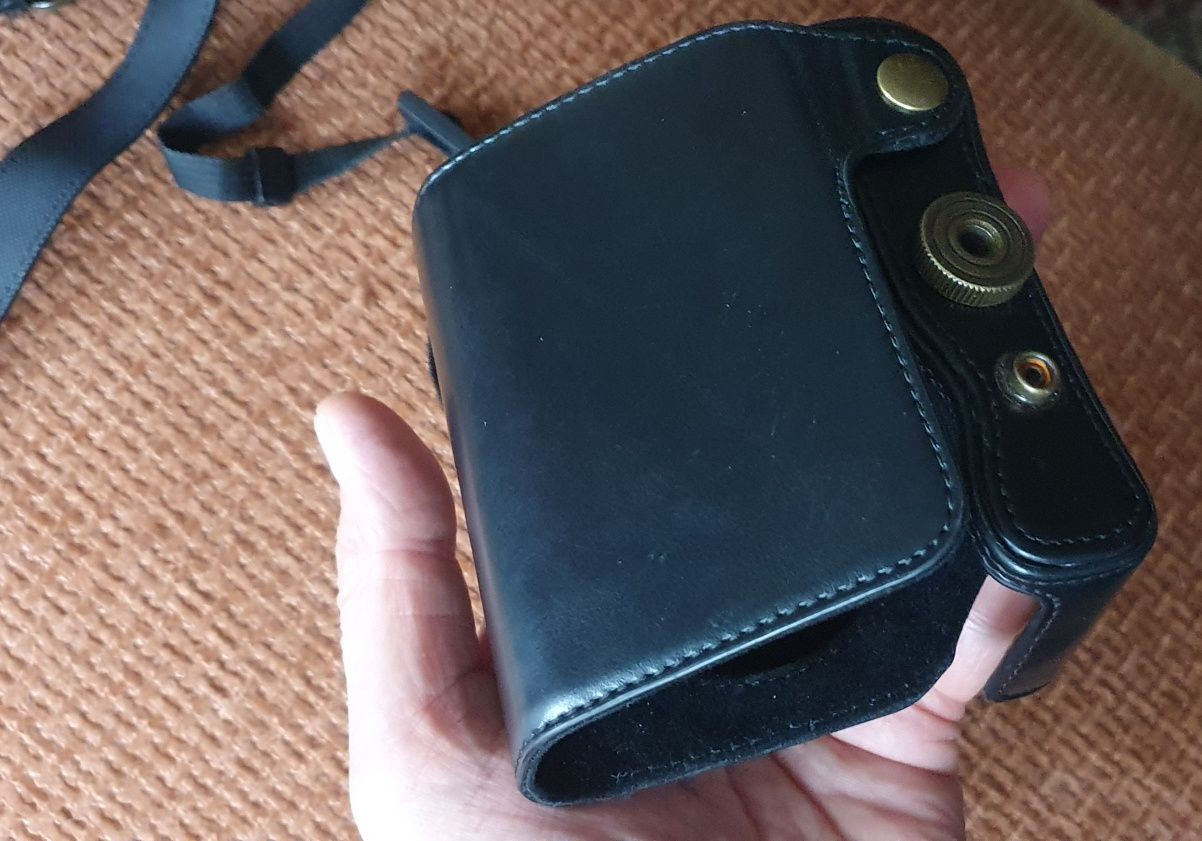 Etui Lumix 15 i inne że sobą po środku okazja