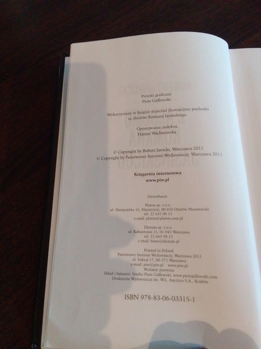 Książka pt. Z albumu Romana Jasińskiego. Autor: Robert Jarocki. PWN