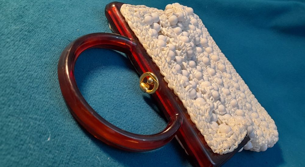 Pochete feminina anos 60