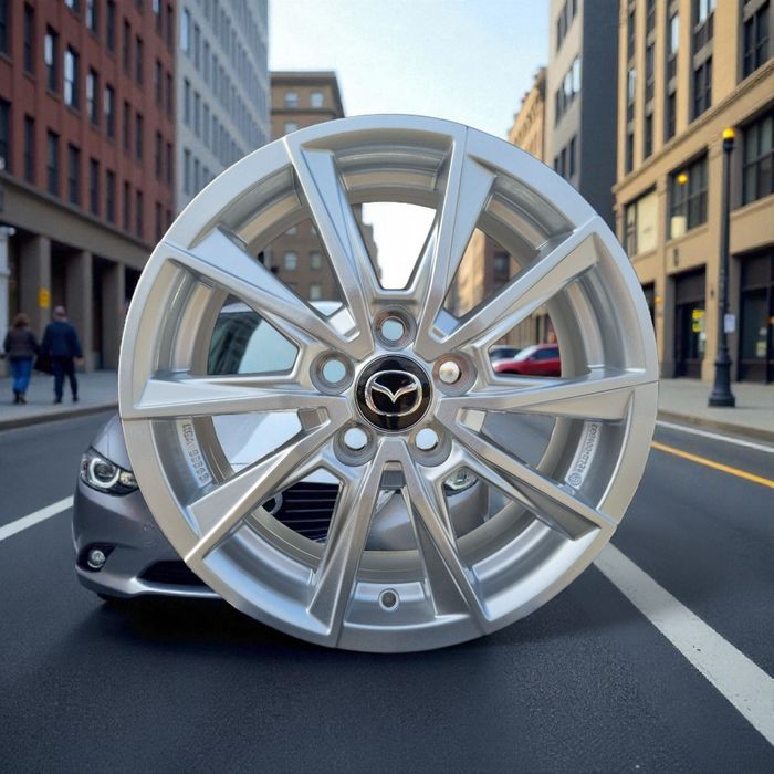 Felgi 15 " Mazda Mazda2 Hybrid XP210 [2021-obecnie) Nowe alu Srebrne