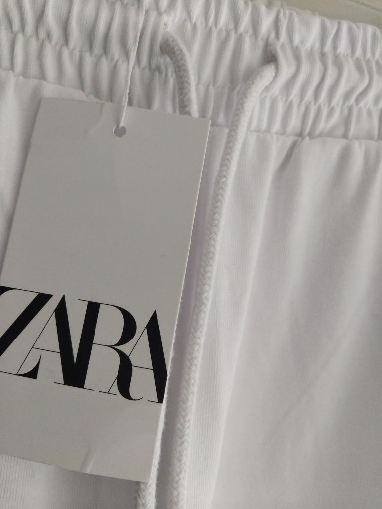 Spodnie bawełna 100 % białe szerokie wysoki stan XS34 .