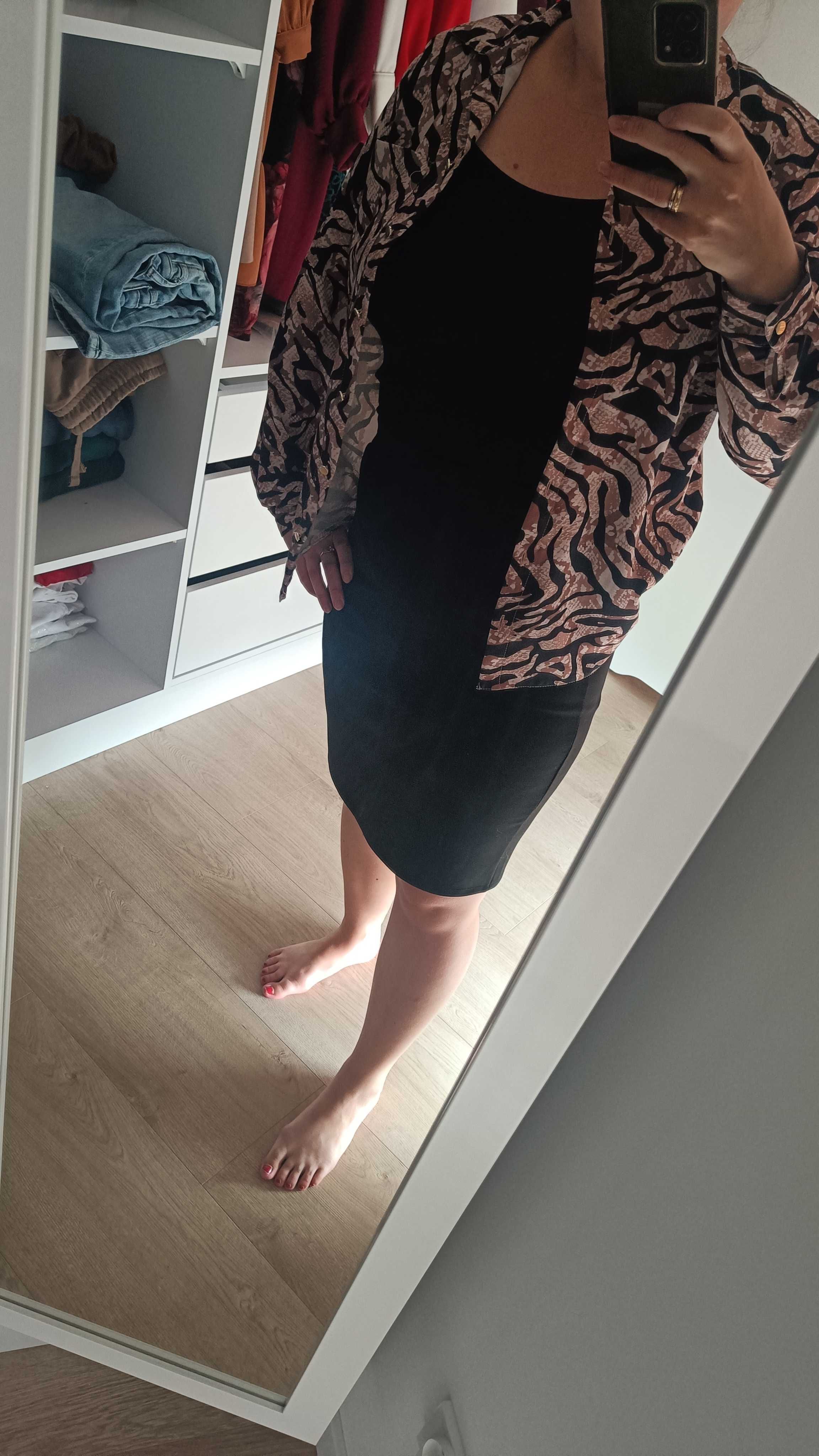 Czarna elegancka spódnica, dopasowana spódnica z rozporkiem