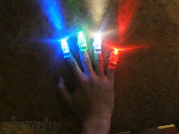 Светящиеся фонарики колпачки игрушки на пальцы