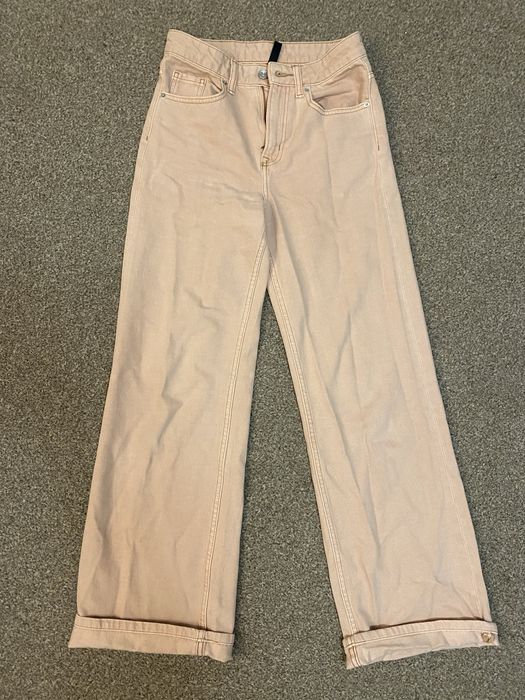 Różowe jeansy H&M