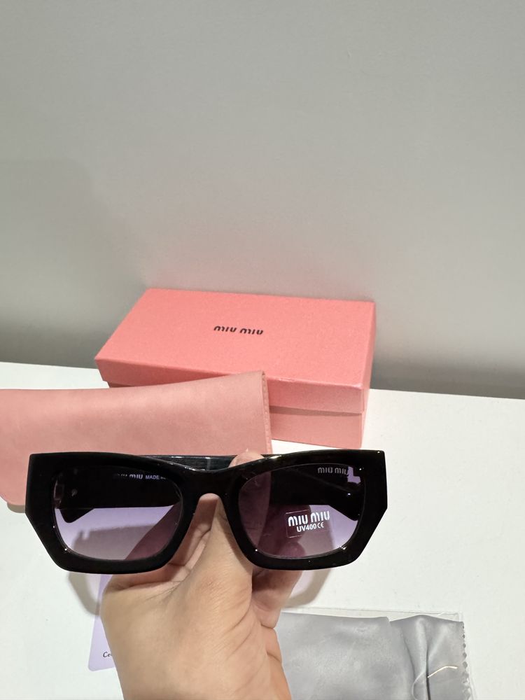 Oculos de sol (miu-miu)