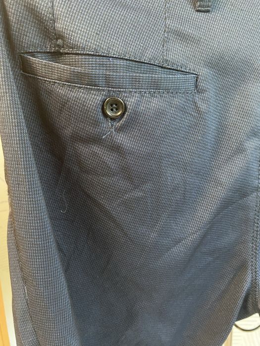 Брюки темно синие в мелкую клетку на мужчину или подростка