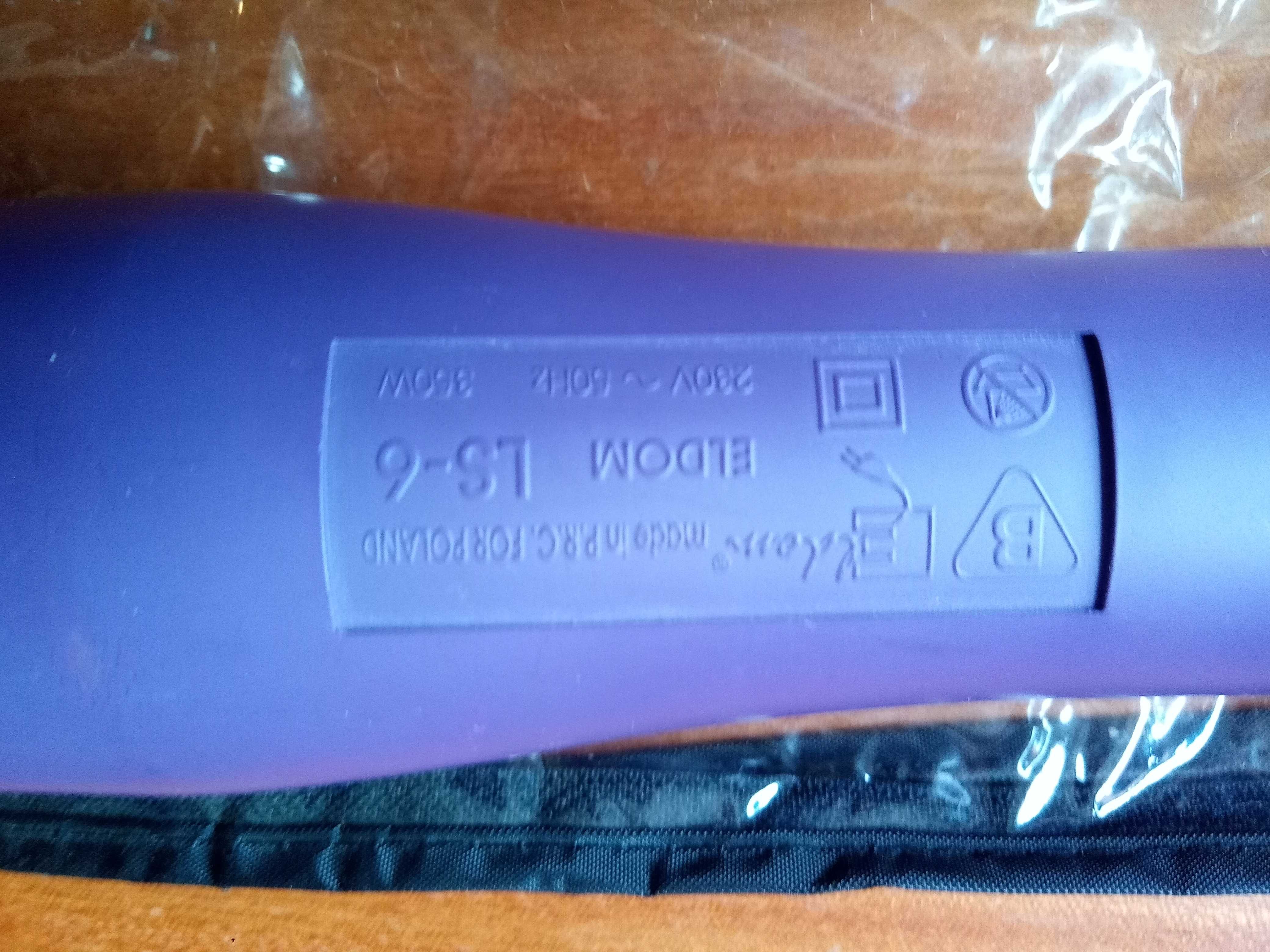 Suszarka do włosów " Eldom " wraz z końcówkami do stylizacji.
