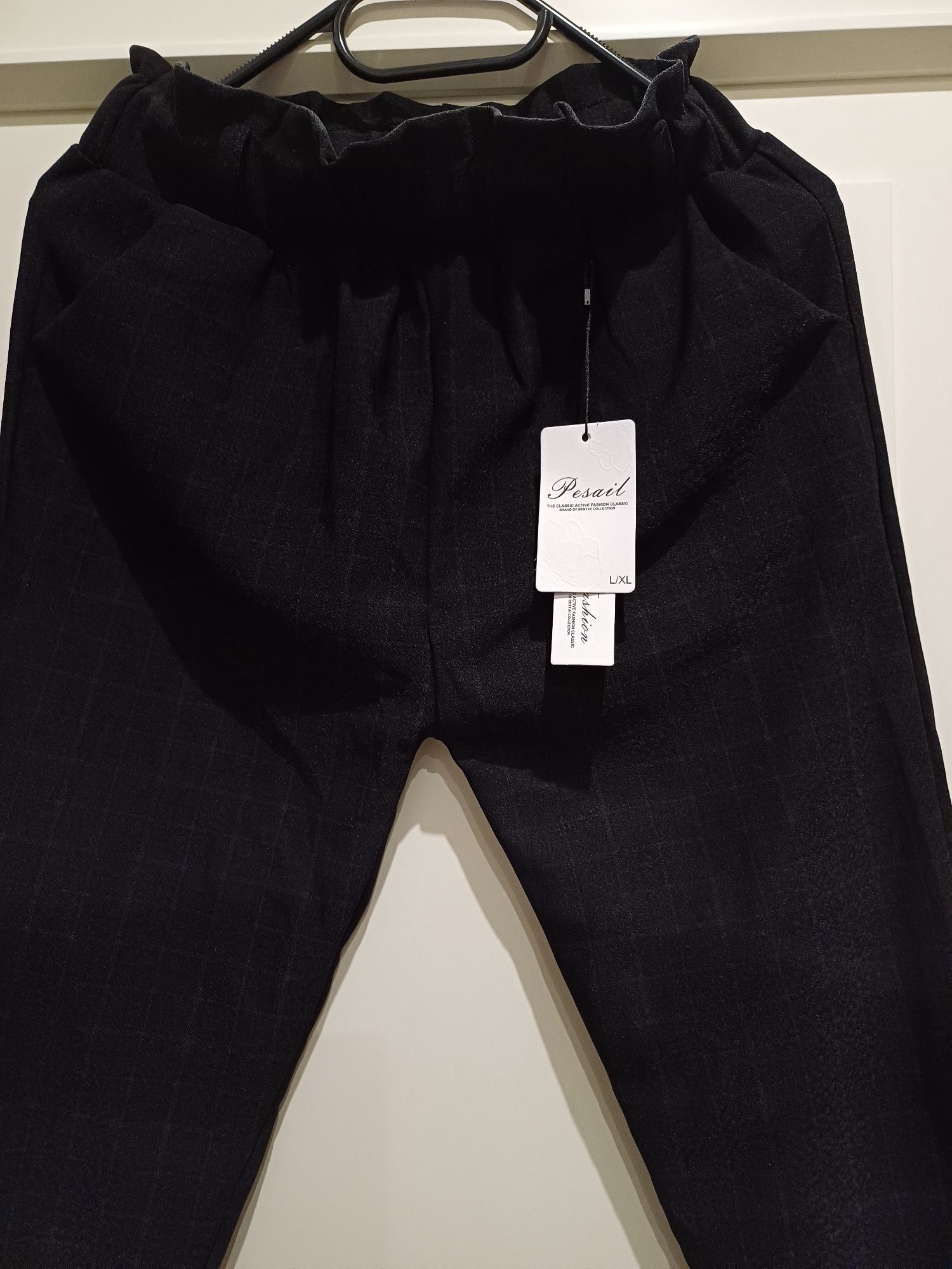 Eleganckie spodnie w kratkę