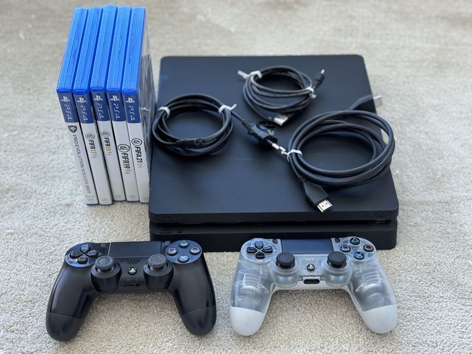 PS4 Slim (500GB) + 2 comandos + 5 jogos