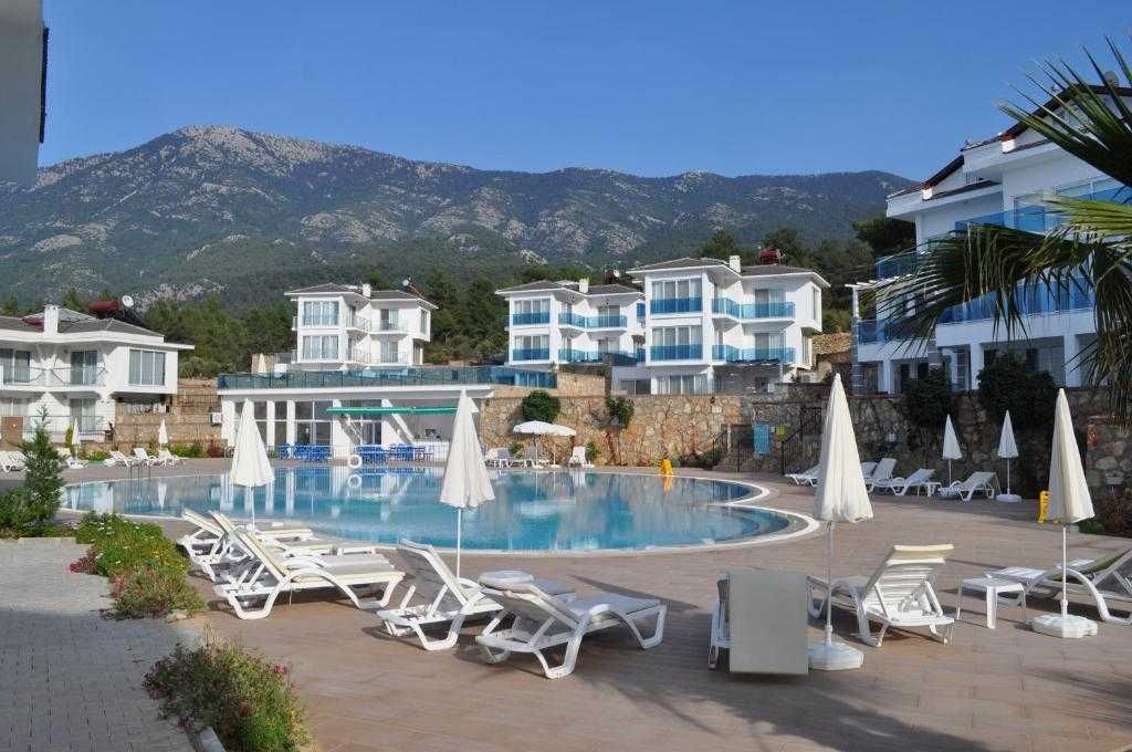 Аренда апартаментов 2+1, 90 м.кв. Личный сад с барбекю.Олюдениз,Турция