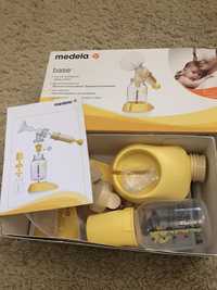 Молокоотсос Medela