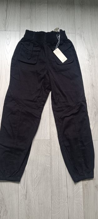 Spodnie z łańcuszkiem nowe 158