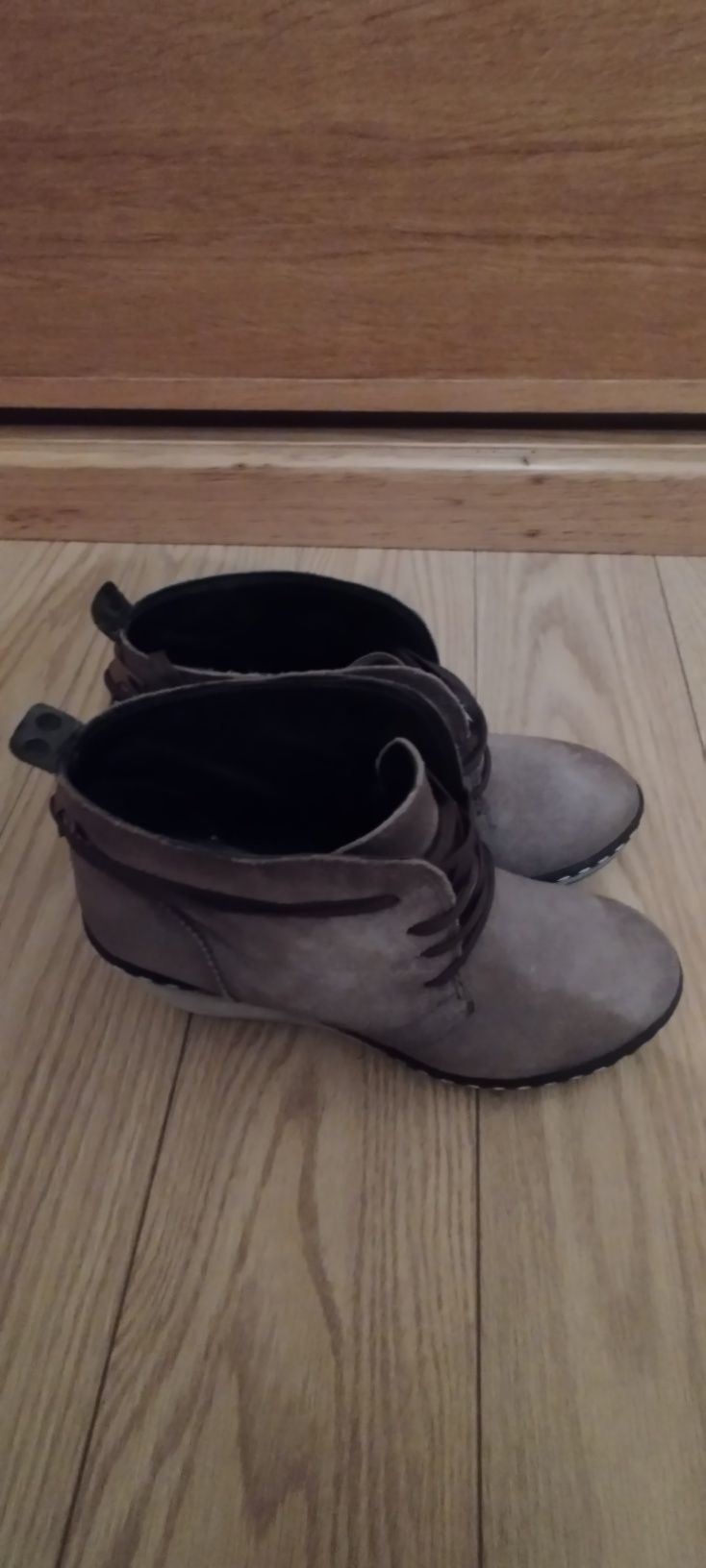 Botas de mulher em pele