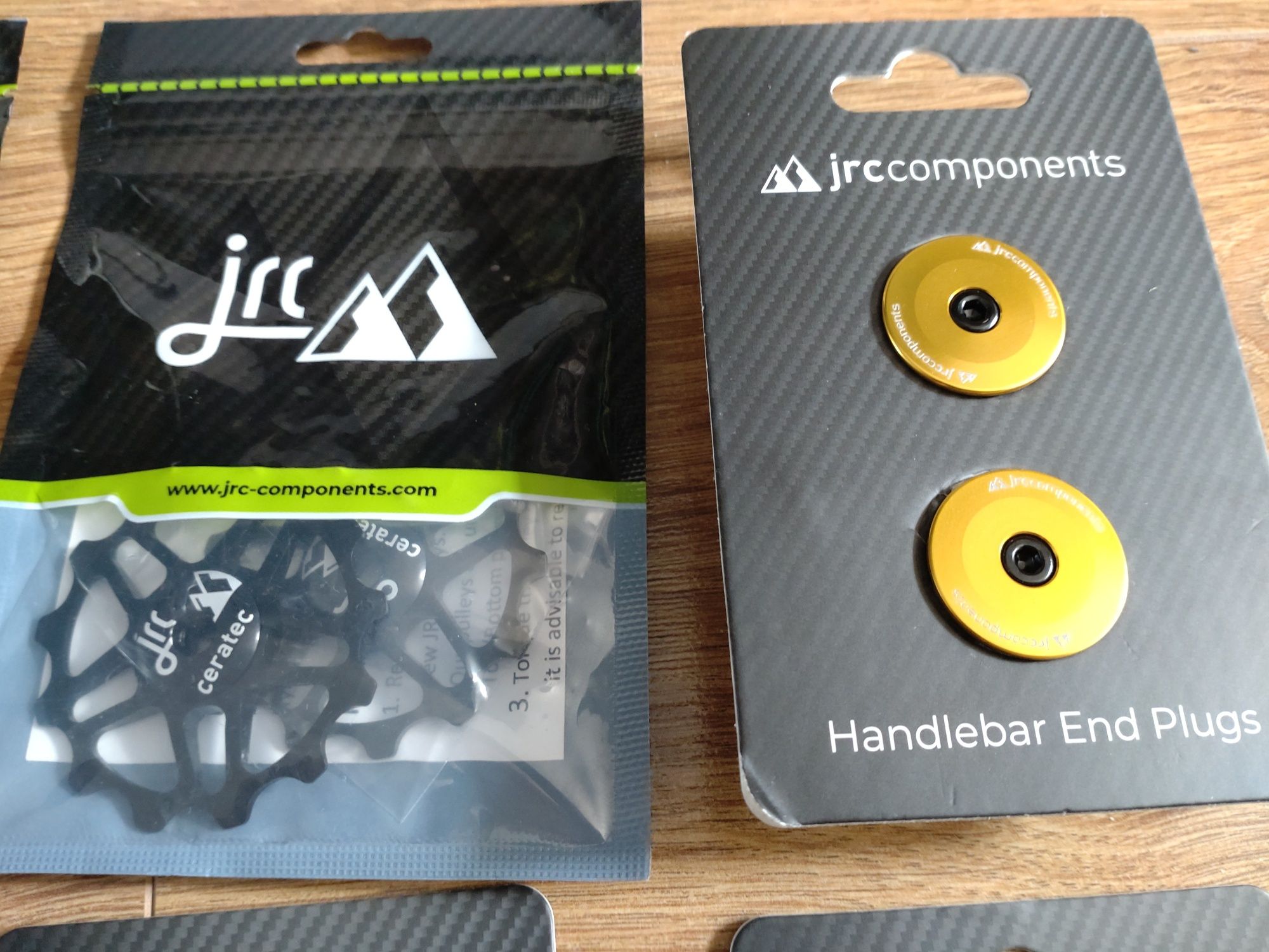 JRC Components uchwyt Garmin, zębatki, zaworki i zaślepki